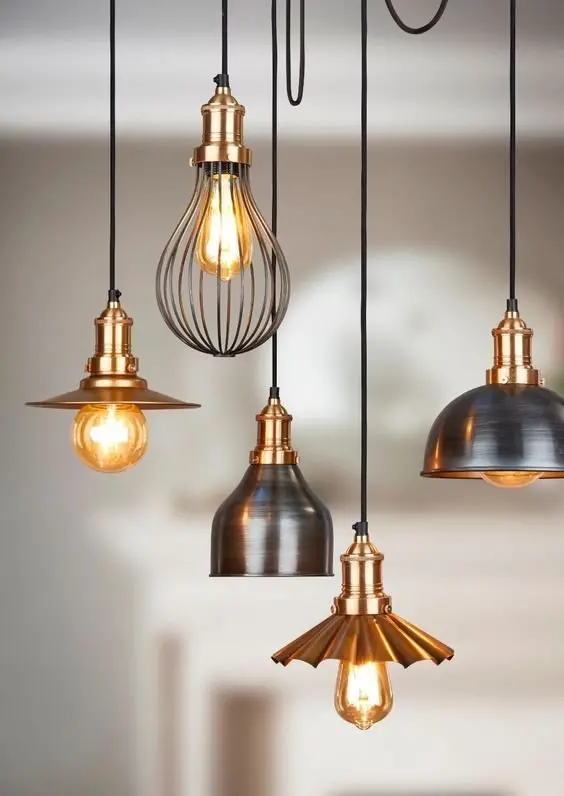Metallic Lighting industrial living room: An easy and beautiful way to inject an industrial air to your interior design is by adding some