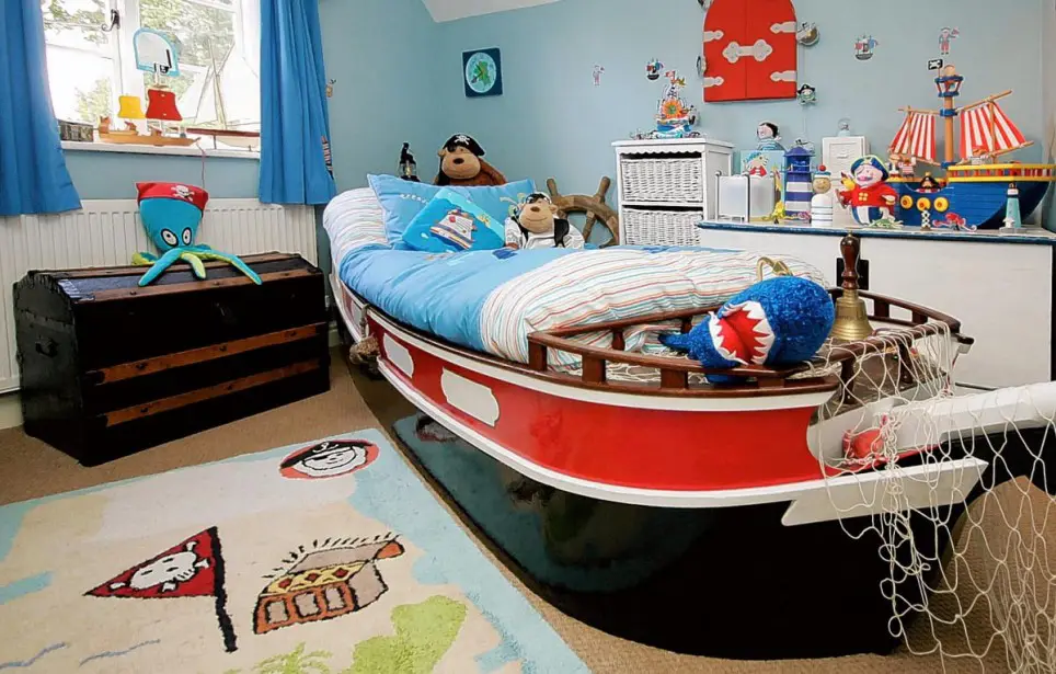 boat bed in a pirate themed bedroom