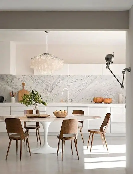 Nordic white kitchen with marble splashback