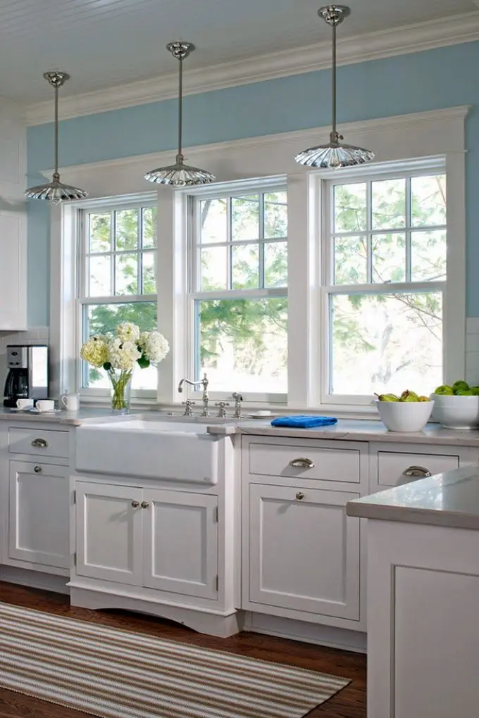 white and blue kitchen with shaker cabinets