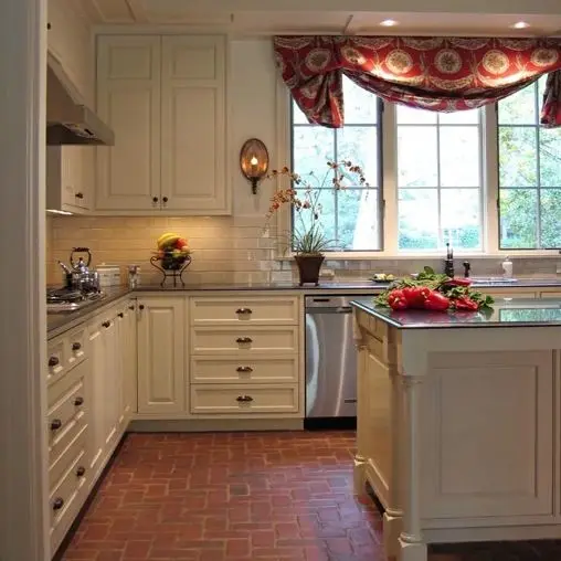 farmhouse kitchen with red brick floors