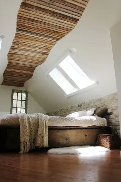 bedroom with sloped ceiling