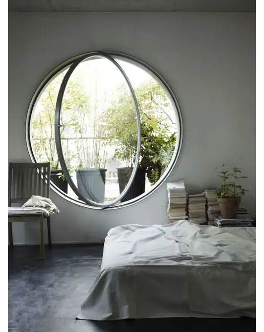 bedroom with porthole