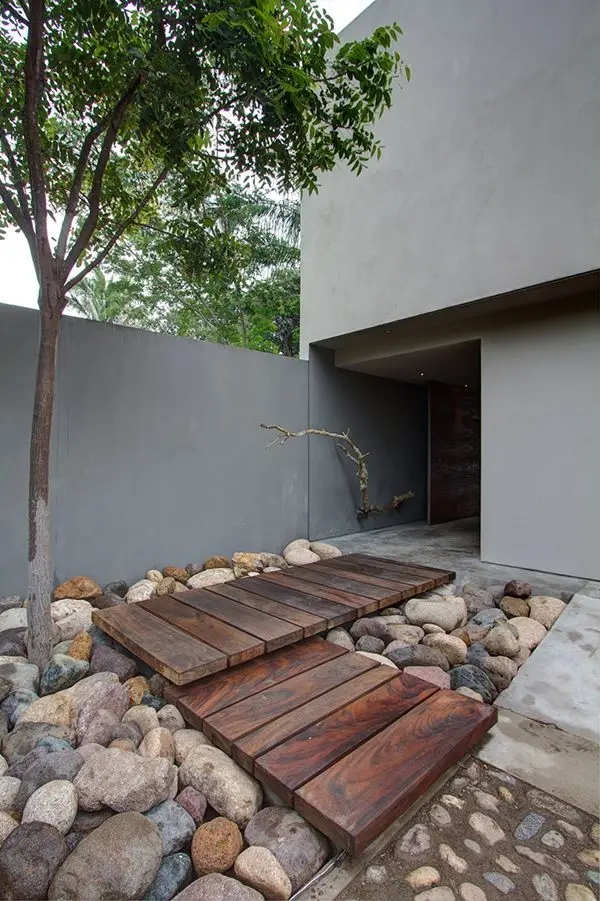 modern stone, wood and concrete front yard