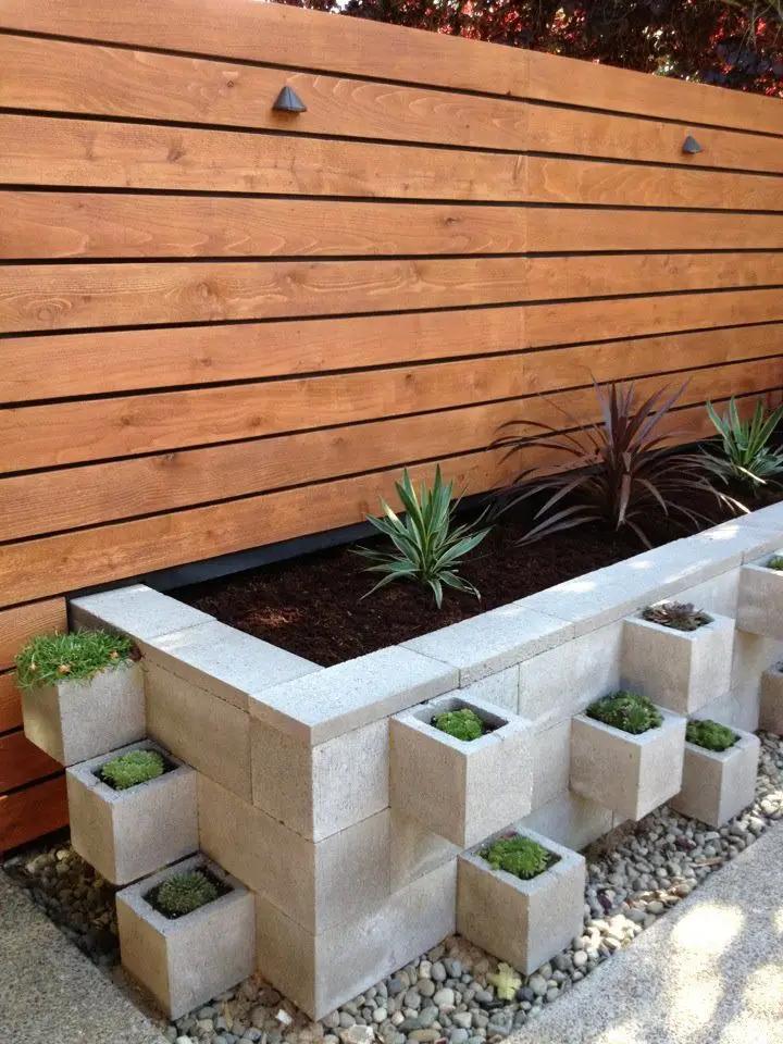 wood fence and space saving square planters