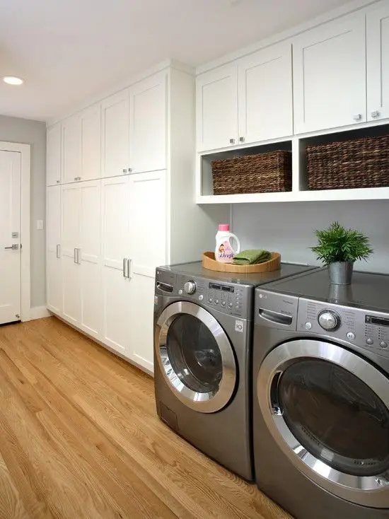 laundry with ample storage room