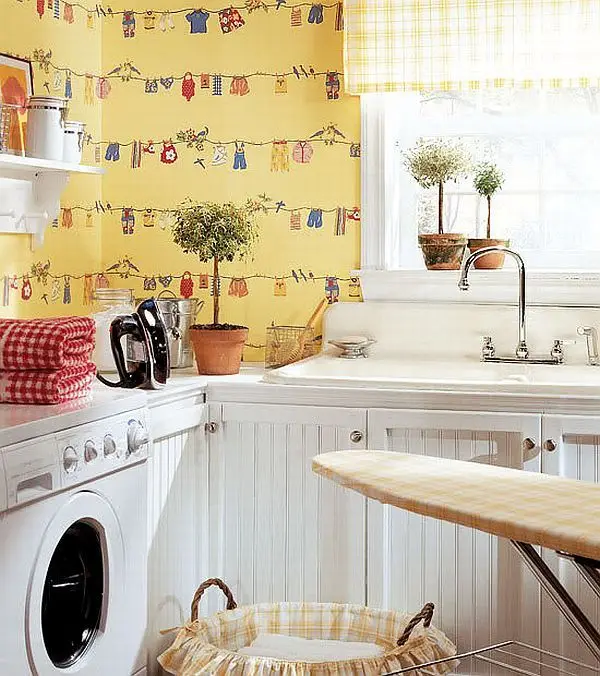 charming yellow wall papered laundry