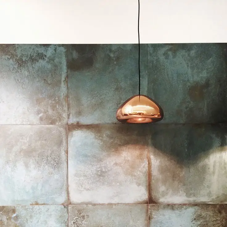 oxidized brass kitchen splashback
