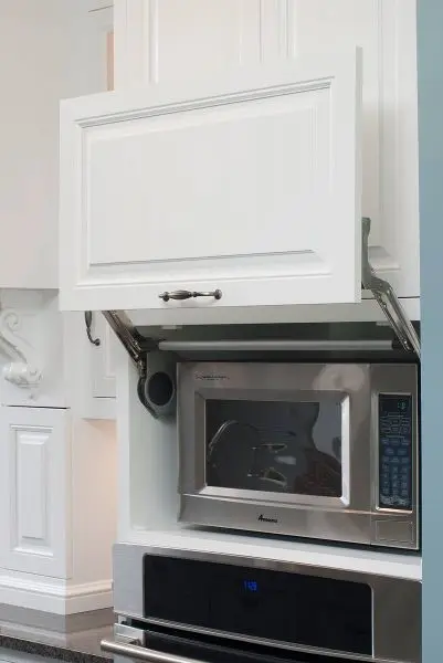 microwave shelf with hinged door
