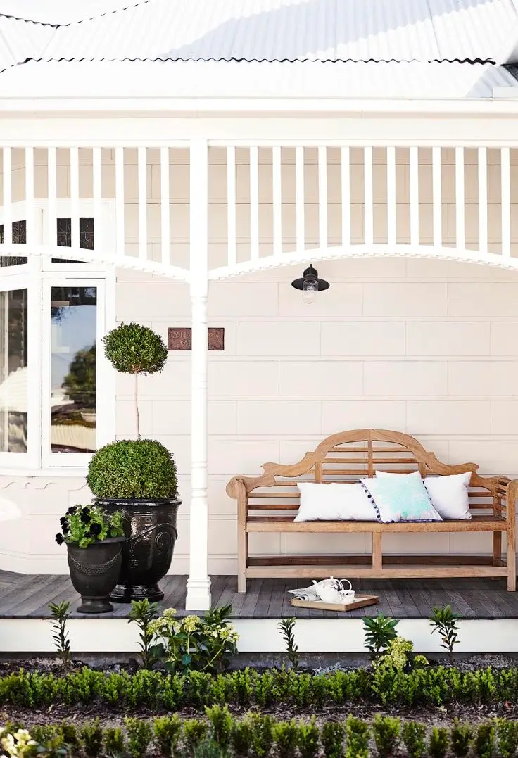 verandah with wooden artisan bench