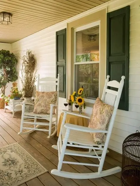 old country verandah with rocking chairs