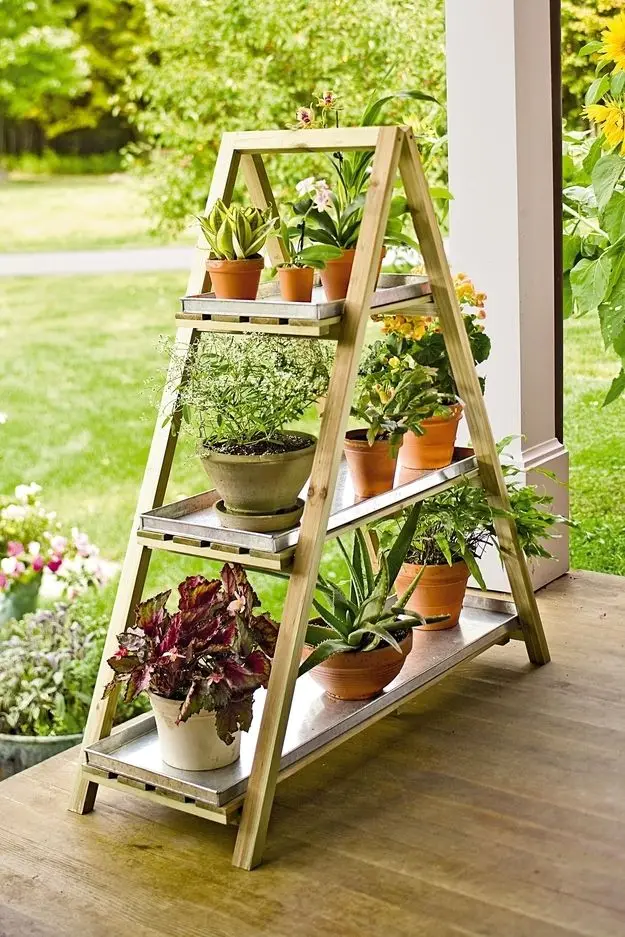 Potted Garden front verandah: Small pots on a triangular stand give you a garden you can rearrange in ten minutes. Easier