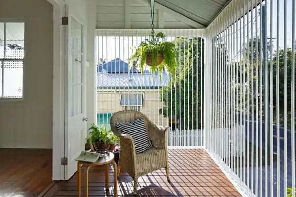 glass verandah with vertical blinds