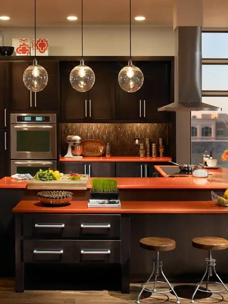 brown kitchen with orange countertops