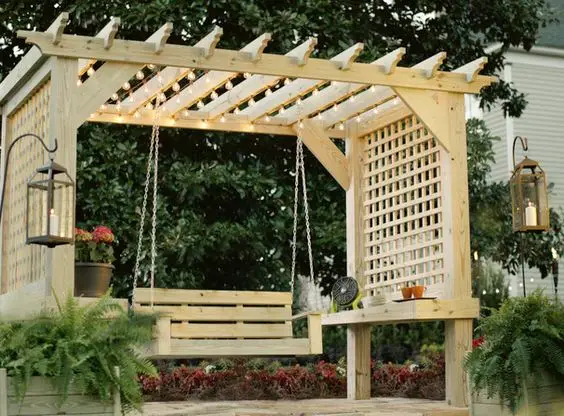 cosy wood pallet pergola with swing