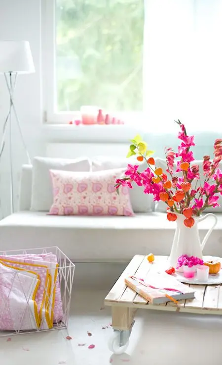 bright flowers in white living room