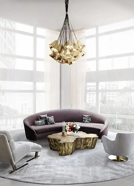 upscale living room with golden bells chandelier