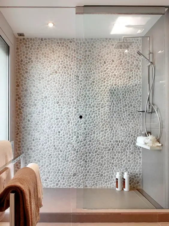 white pebble shower wall