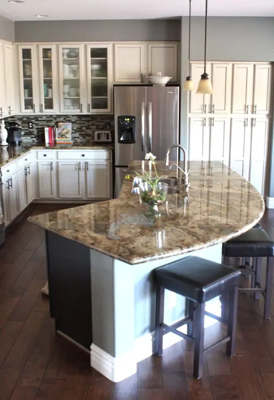 elegant kitchen with curved island counter