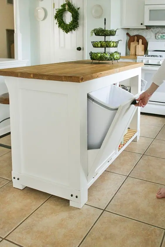 kitchen island with swing out garbage bin