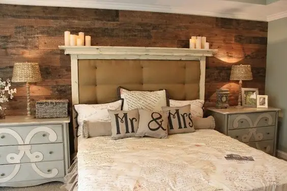 Rustically Romantic master bedroom: This farmhouse inspired bedroom is charming, welcoming, and romantic. Bare wood planks