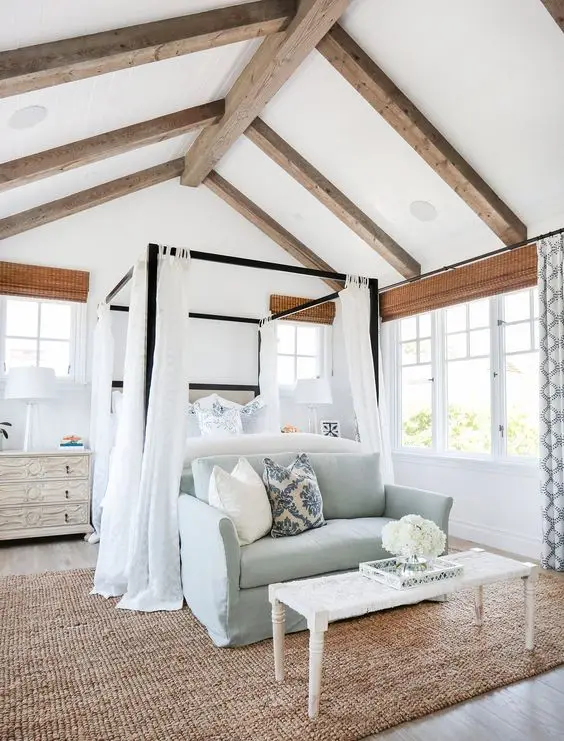 Light and Airy master bedroom: Large open windows let as much naturally lighting into the room. The high ceiling, white