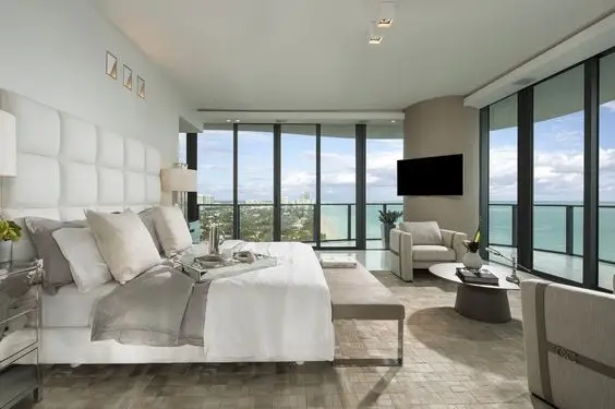 master bedroom with glass walls