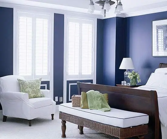 elegant bedroom with blue walls
