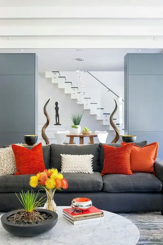 stylish grey and orange living room