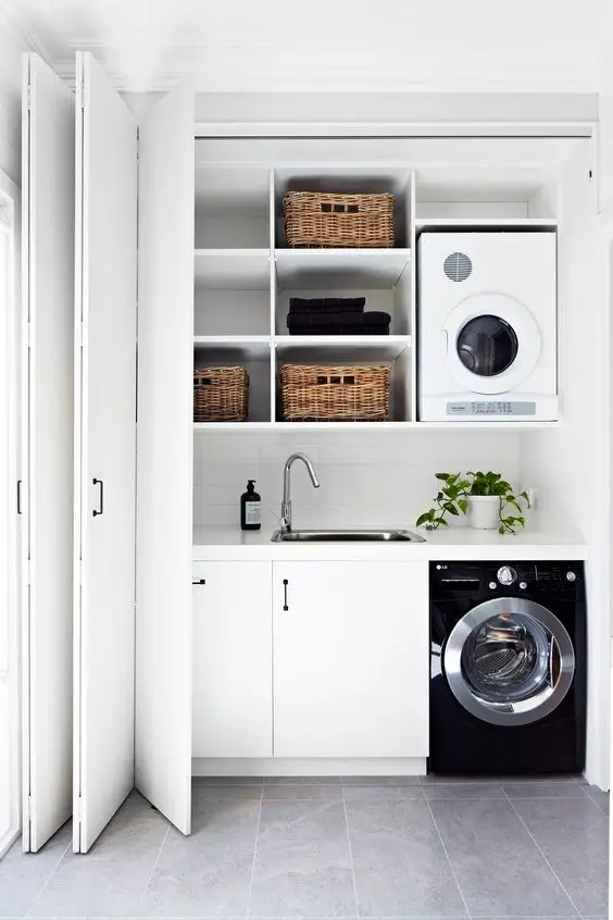 Compact Hallway Laundry: Even a small and compact laundry can be efficient and looks amazing too! The use of open shelves