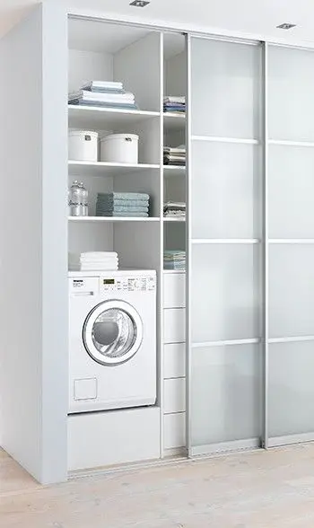 white modern laundry with sliding door