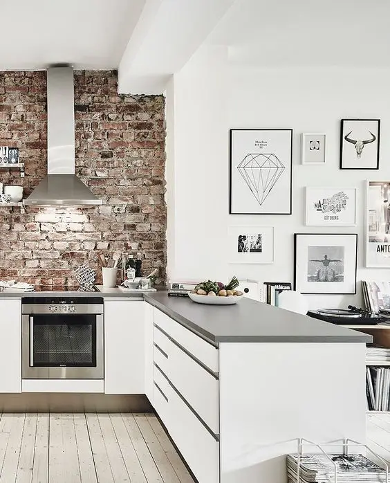 modern kitchen with brick wall