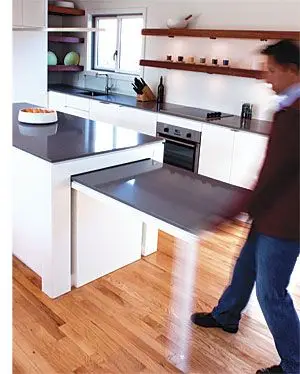 Hideaway Kitchen Counter: This cleverly installed kitchen table can come in handy when needing extra work space and can also