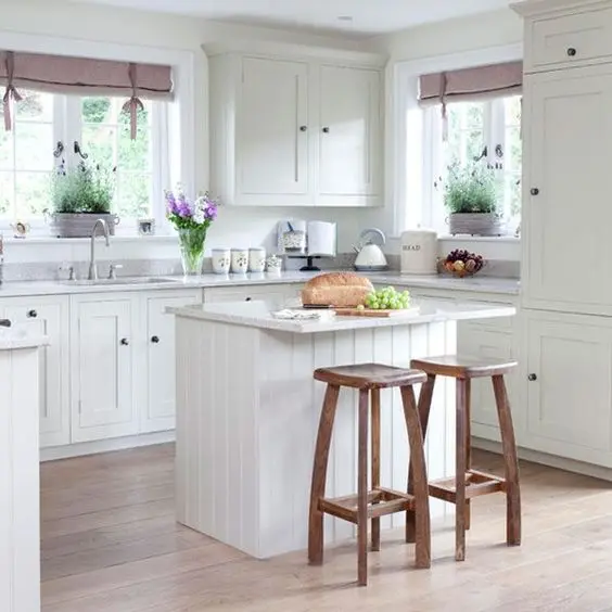 Pops of Lavender small kitchen: This is one kitchen design that will never grow old. This small cottage kitchen is