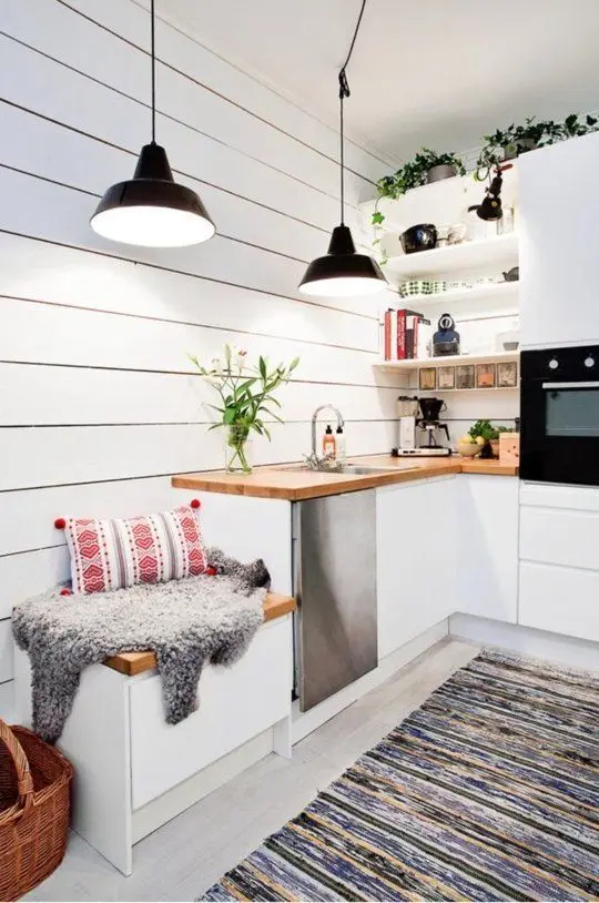 Chic and Efficient small kitchen: A few square feet off the corner of the room is all you need for a complete kitchen. This