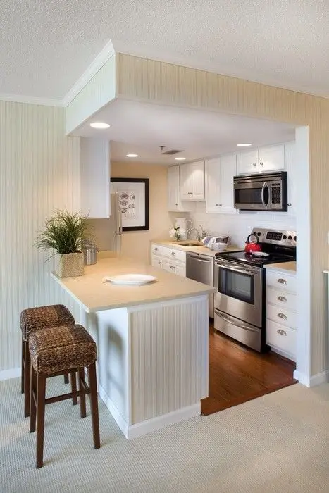 The Cube Kitchen: The cube clearly defines the kitchen area without closing out or cramping the space. Keep things neat and