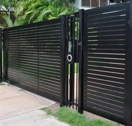 Contemporary Wrought Iron Fence: Solid black verticals, straight top rail, modern latch hardware
