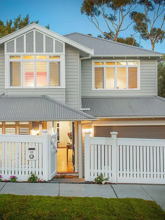 Modern White Picket Fence: Pickets still work; they've just been simplified