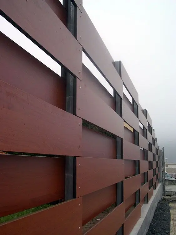Modern Wood Privacy Fence: Angled slats here, rather than flat boards