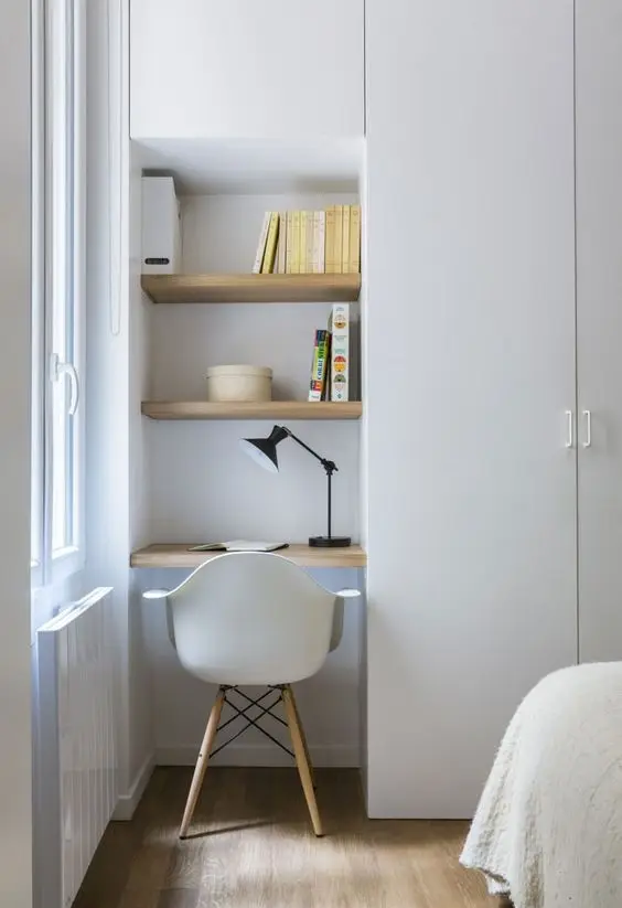 Closet Nook study area: No room for a desk? Use up one of your closets. Take out the door and install shelves and power