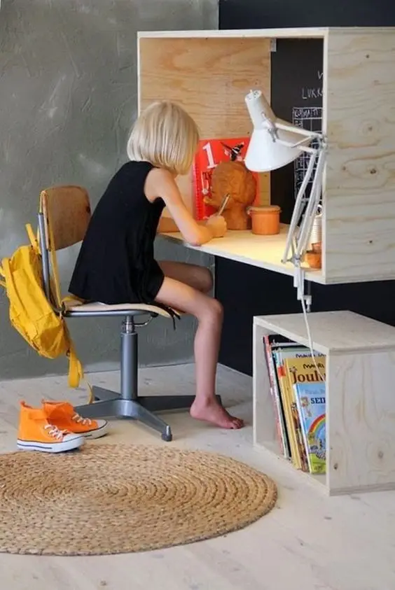 girl working in a study box