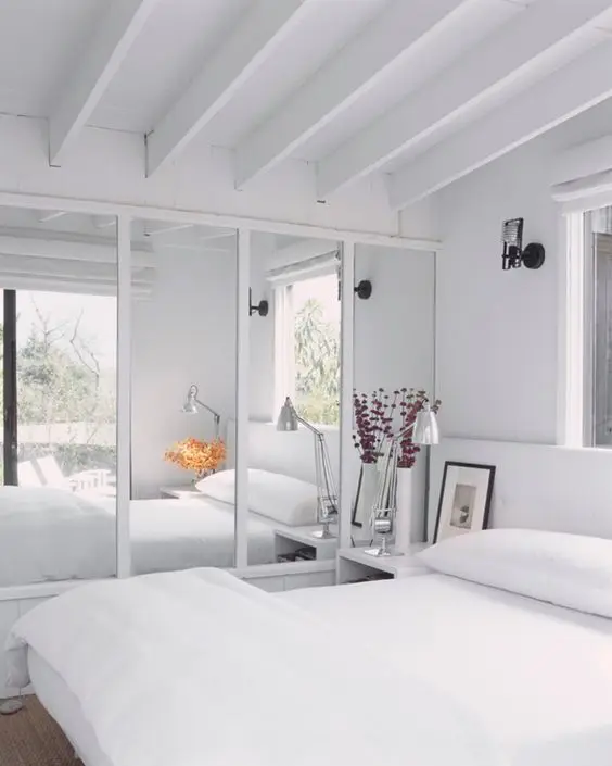 white and mirrored bedroom