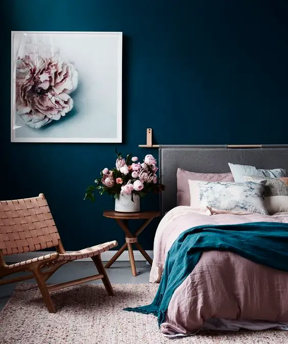 Roses and Blues Scandinavian interior: If you want to go bold, use colours. This dramatic and beautiful bedroom is full of