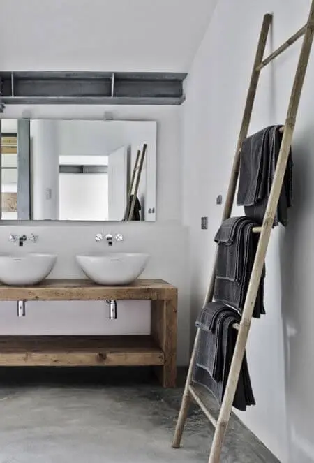 Ladder Towel Bars Scandinavian interior: The wooden towel bars add just the right touch of rustic sophistication to the