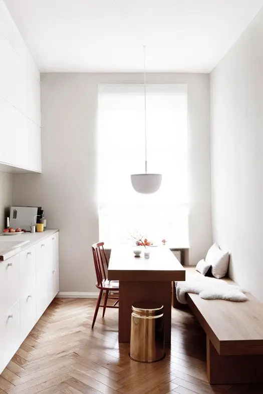 White and Wood Scandinavian interior: White walls help make the room look bigger than it is. The classic Scandinavian clean