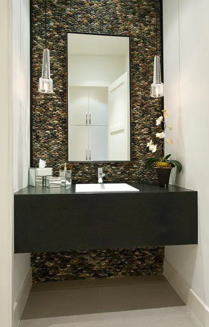 Stone-Walled powder room: This stacked pebble wall is simply arresting as it is undeniably mesmerising, colourful and