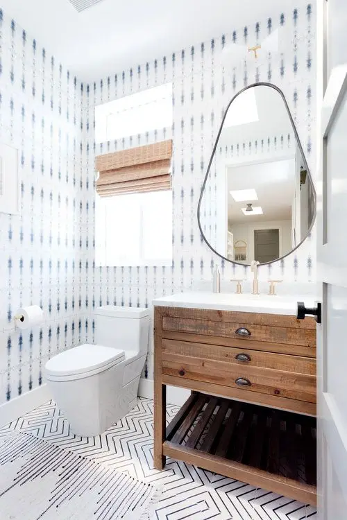Patterned White powder room: White themes are amongst the most preferred powder room ideas and designs. But plain white is