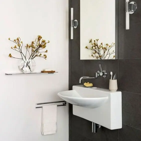Wall-Mounted Sink powder room: Even smaller powder rooms can look elegant and roomy. The secret is on using smaller fixtures