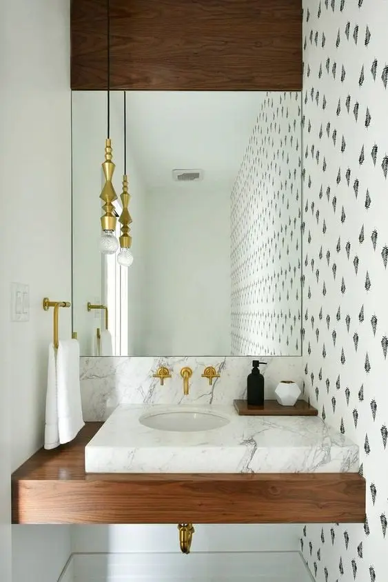 Golden Accents powder room: A touch of gold can turn the ordinary room into an impressive one. Add just the right dose of
