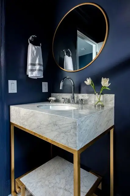 Navy and Gold powder room: The right mix of colours and accents can spell the difference between a generic hotel room